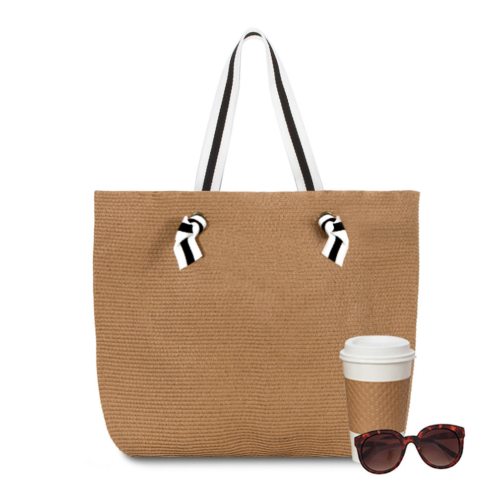 monogrammed straw purse in car