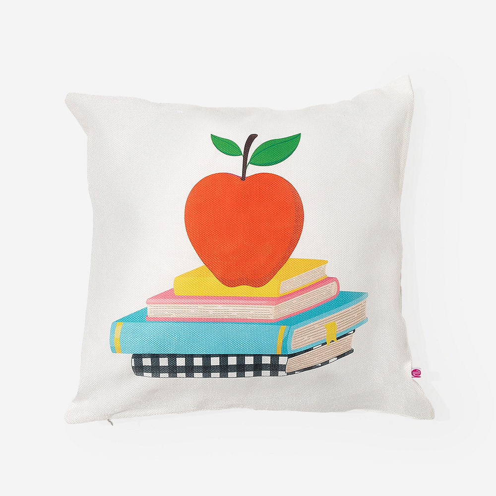 teacher monogrammed pillow sham in apples and books outside