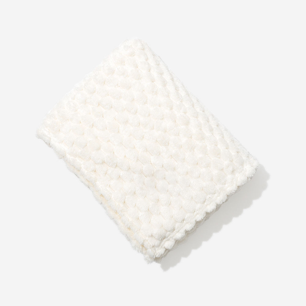 ivory textured plush blanket up close