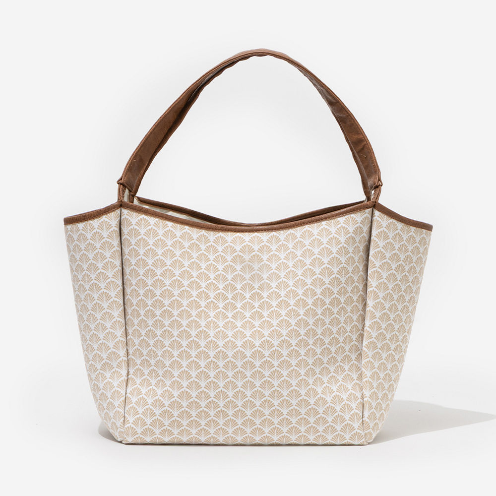 khaki shells timeless tote bag in car