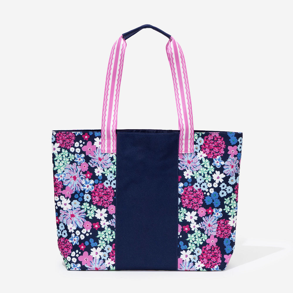 model wearing vintage floral tote bag