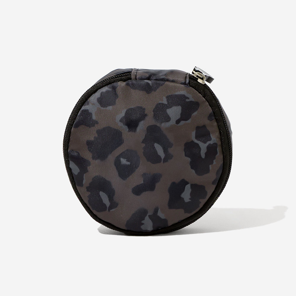 inside of black monogrammed jewelry travel case