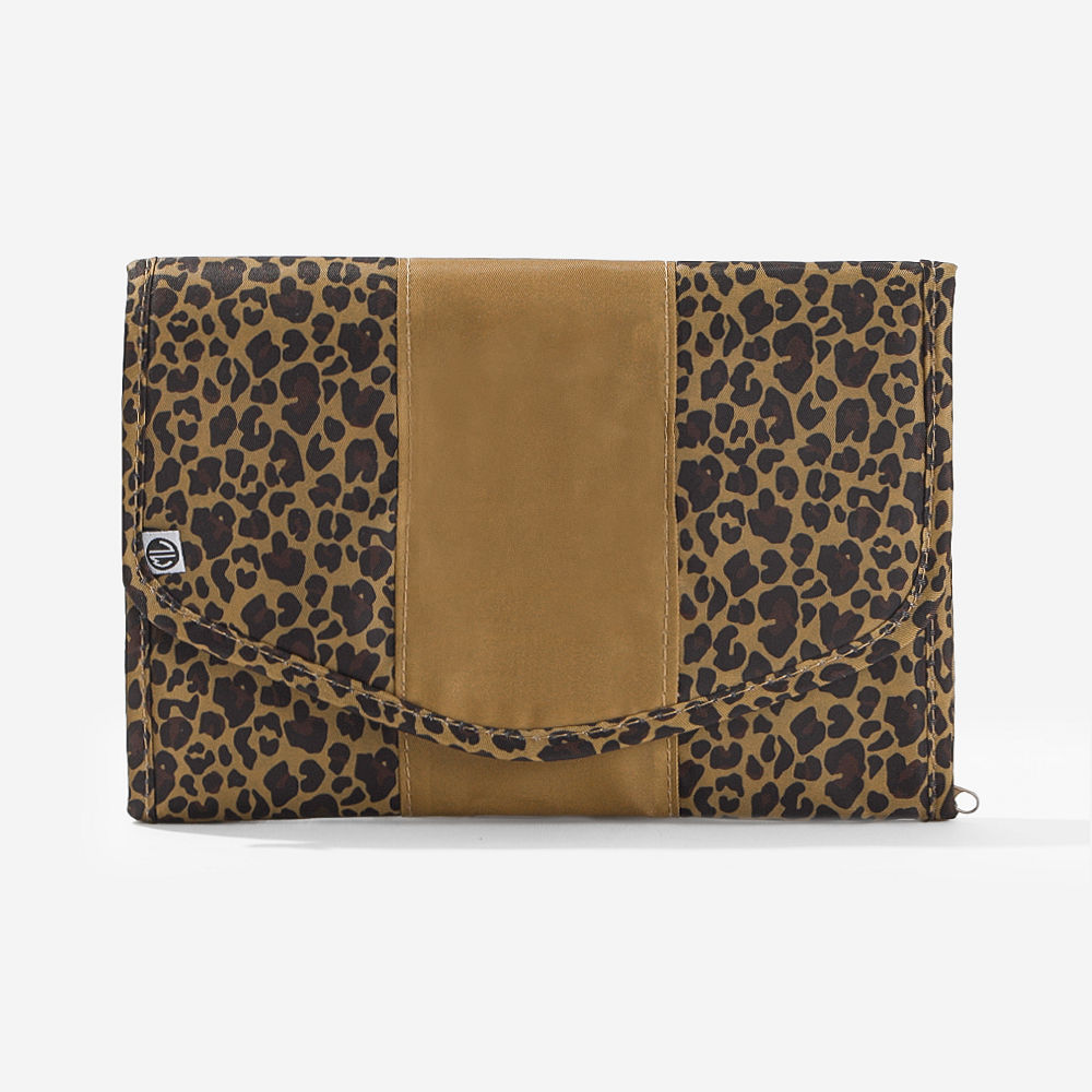 inside of monogrammed travel jewelry organizer in leopard