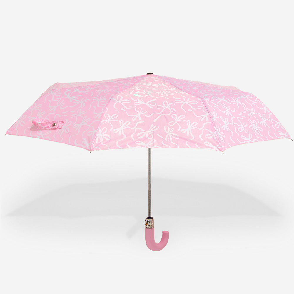 tan checker umbrella in hands