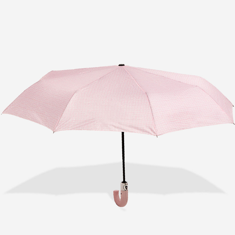 tan checker umbrella in hands