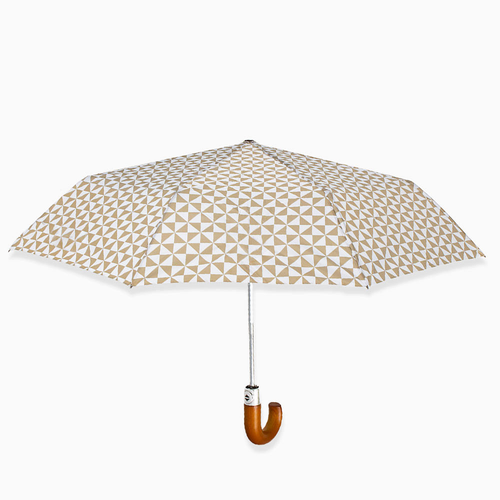 tan checker umbrella in hands