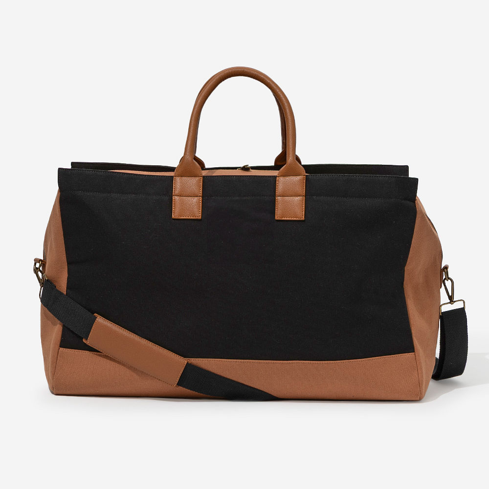 upscale monogrammed weekender in ivory on luggage