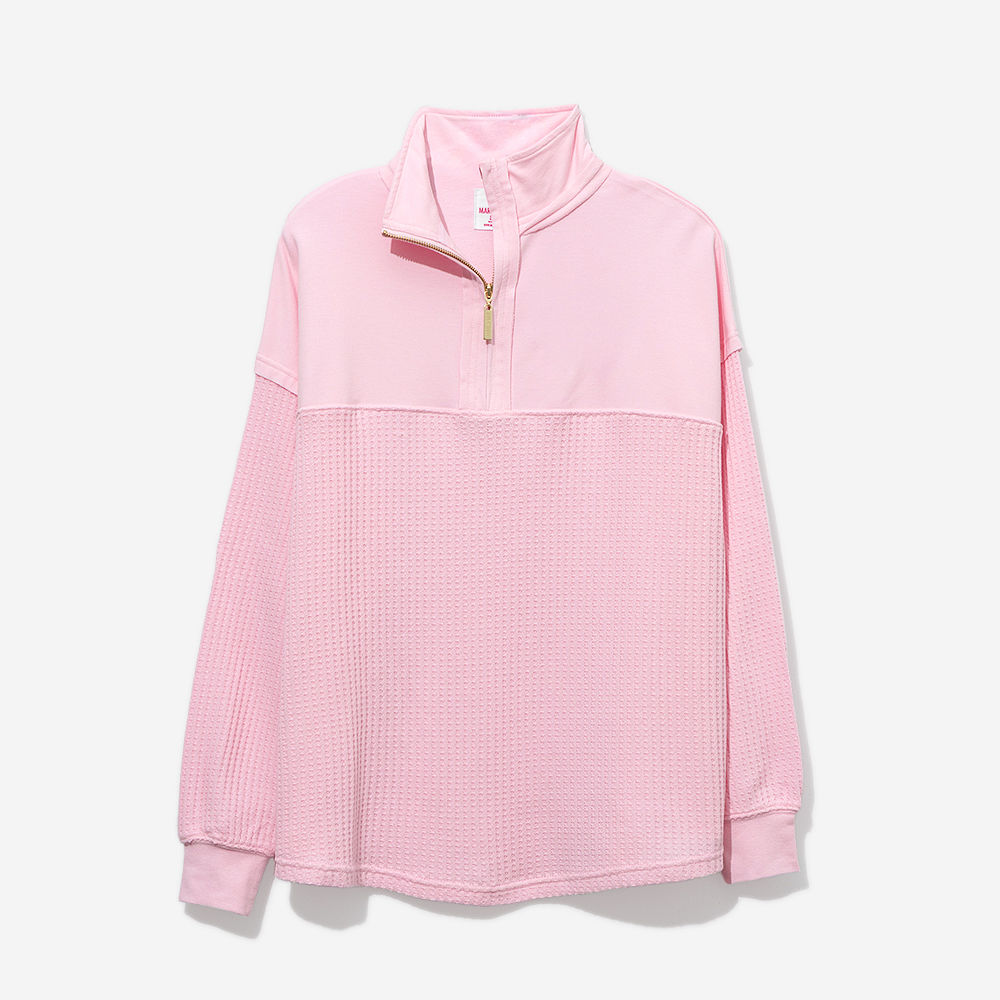 light pink waffle knit pullover up close
