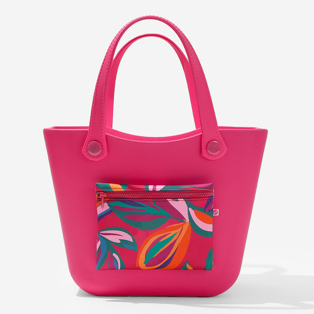 personalized coral floral beach bag at pool