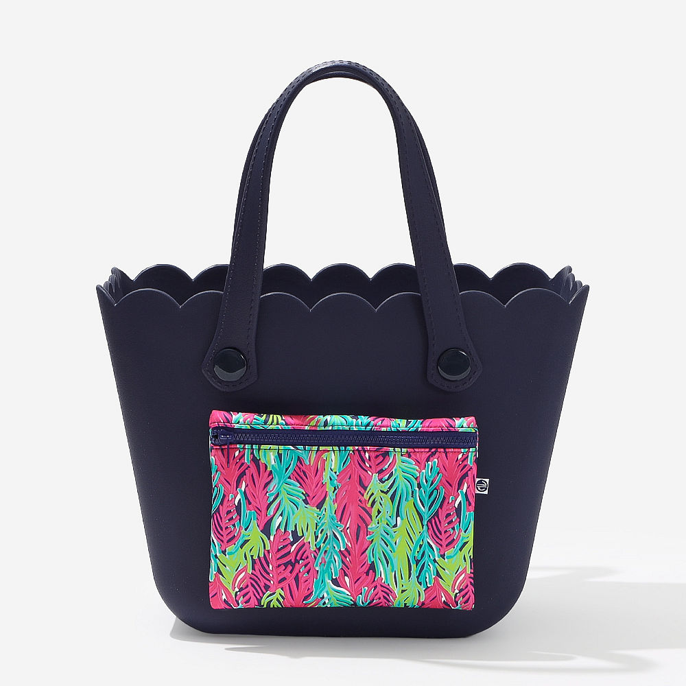 personalized coral floral beach bag at pool