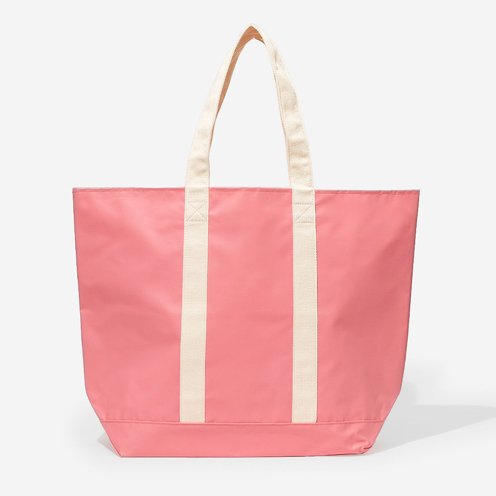 blue waterproof tote with beach towel