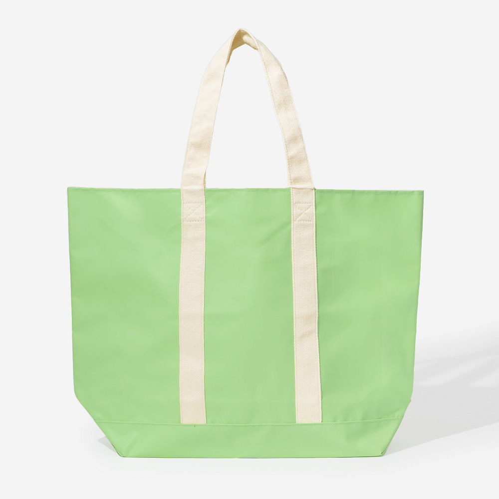 blue waterproof tote with beach towel
