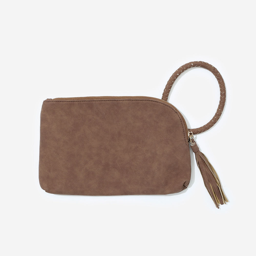 brown wristlet clutch in hands