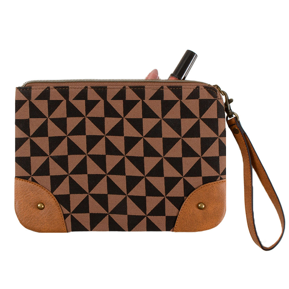 girl placing sunnies into vintage clutch