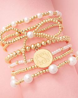 Shop Pearl Bow Bracelet Stack Shop Pearl Bow Bracelet Stack