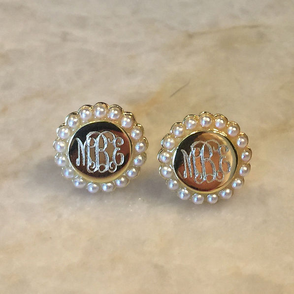 detail of gold pearl stud engraving