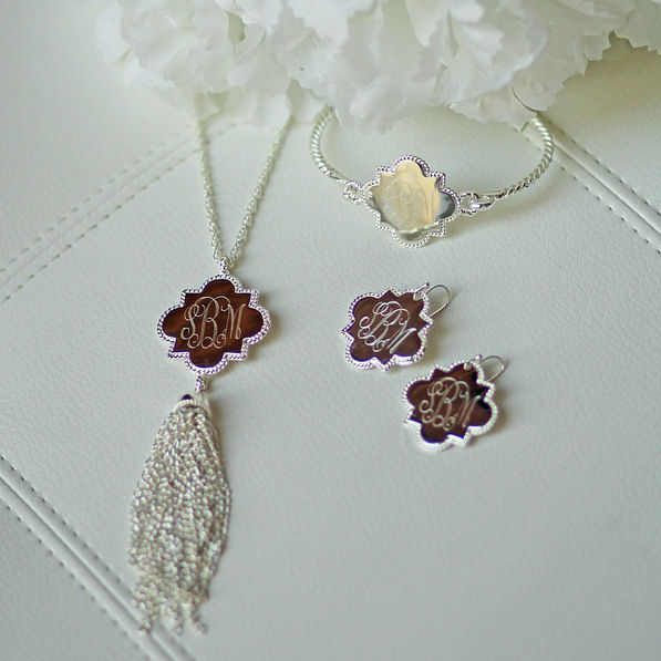 monogram silver jewelry quatrefoil earrings bracelets necklaces