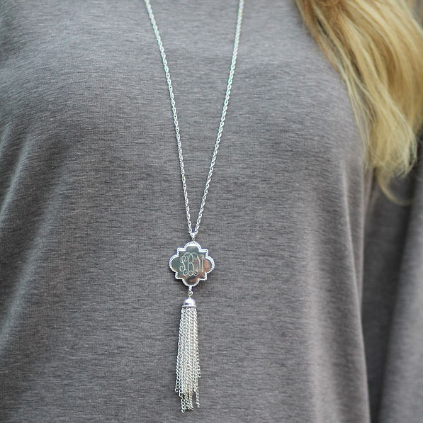 custom silver quatrefoil tassel necklace gray shirt