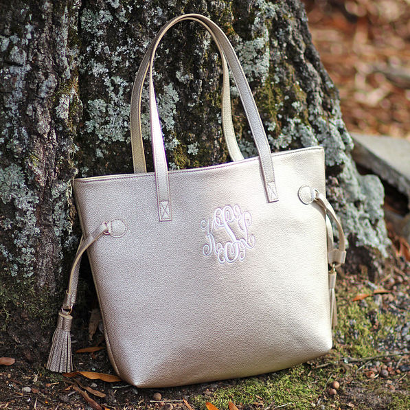 Gold Personalized Purse Against Tree Trunk