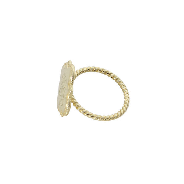 side view of gold monogrammed quatrefoil ring