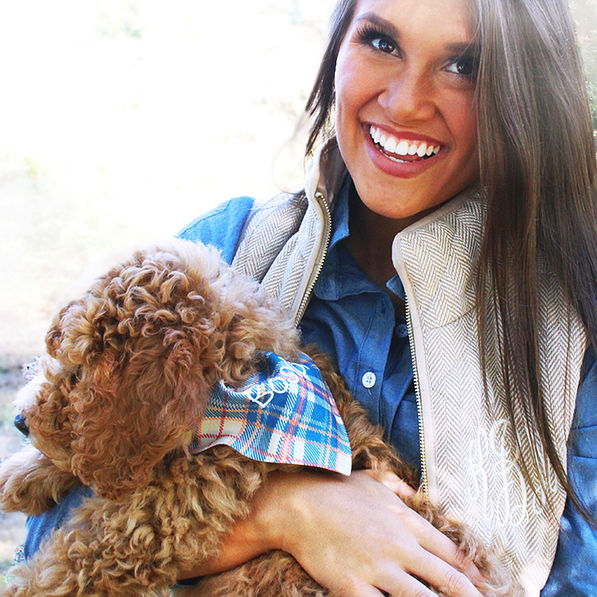 Monogrammed plaid Reversible Dog Bandana on goldendoodle held by girl