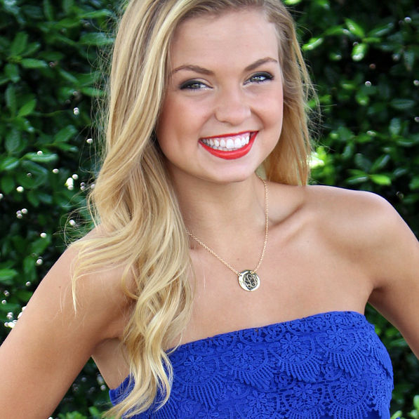 Girl wearing gold personalized chain necklace