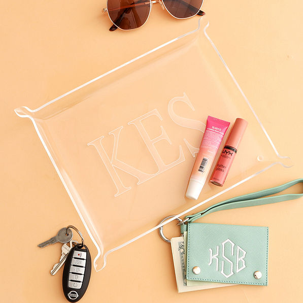 monogrammed acrylic tray on tan paper