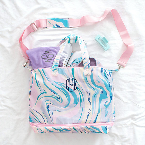 colorful marble expandable travel bag flatlay