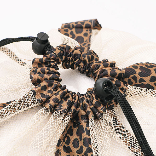 leopard monogrammed packable laundry bag close up of cinch