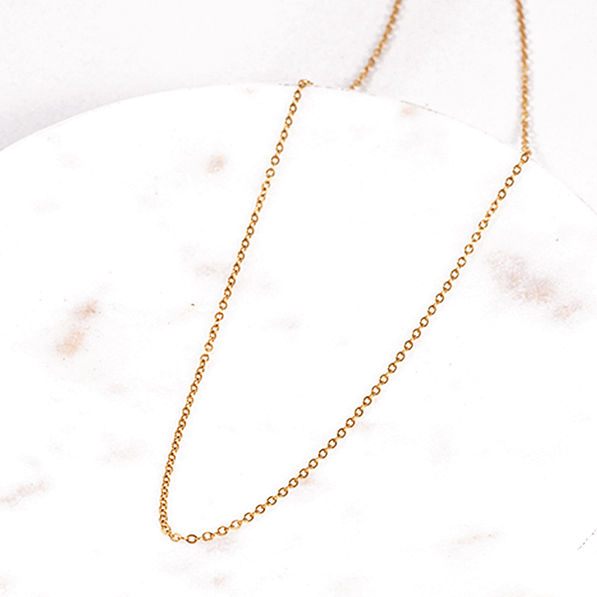 DIY Letter Necklace on marble