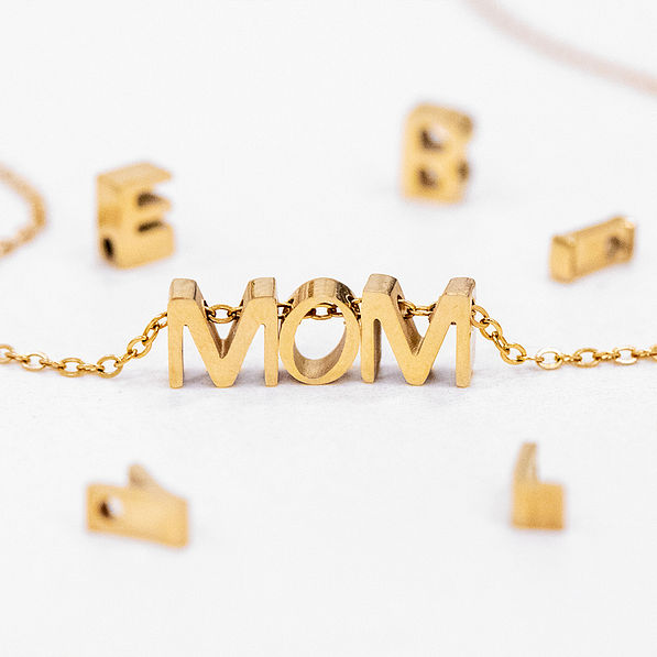 diy letter charm necklace with mom spelled out