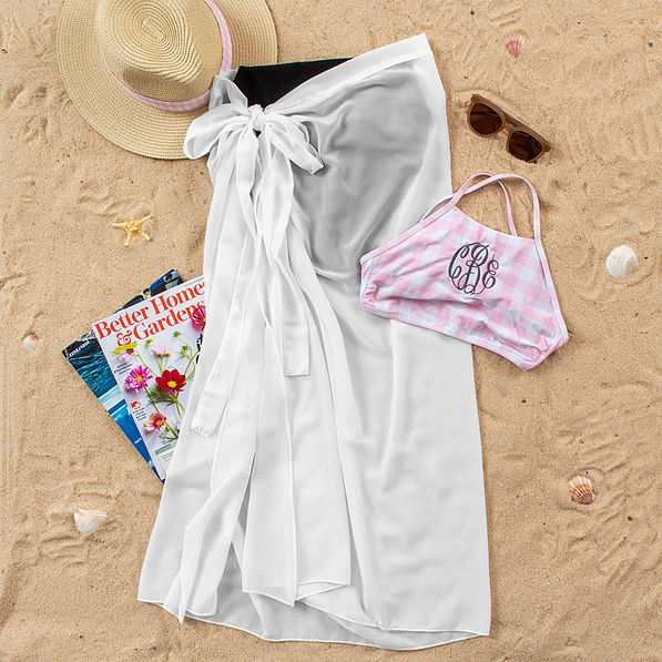 white sarong with pink gingham high neck swim top