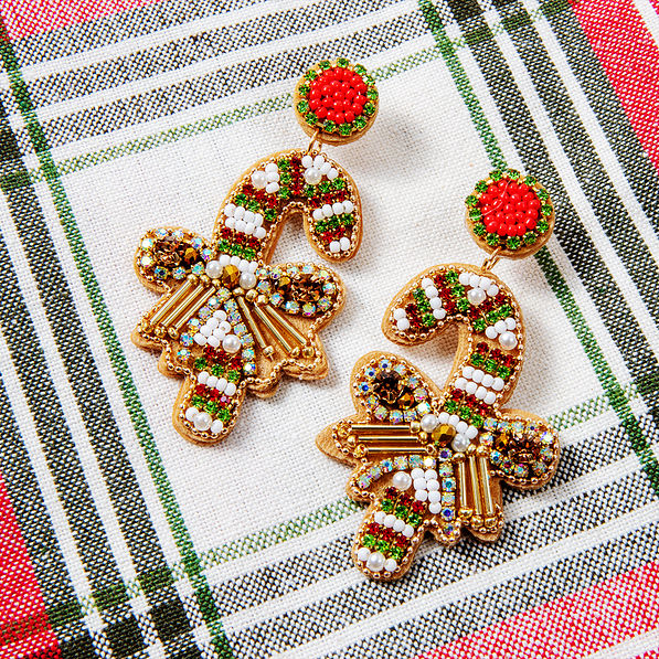 candy cane earrings on plaid