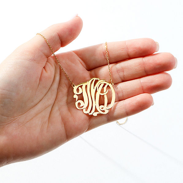 gold plated custom personalized necklace in hand