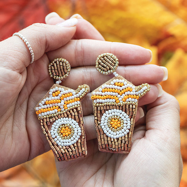 close up of pumpkin spice earrings