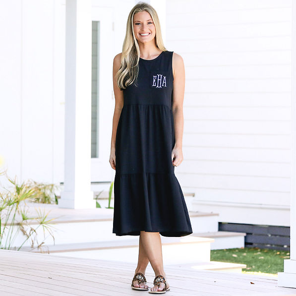 front of black monogrammed ruffle midi dress