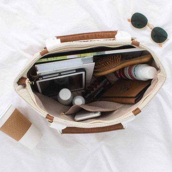 inside of ivory monogrammed charlotte handbag