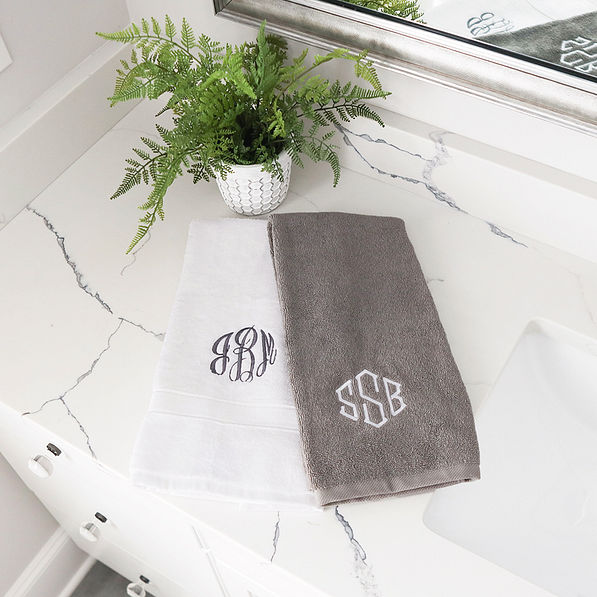 white hand towel with grey hand towel