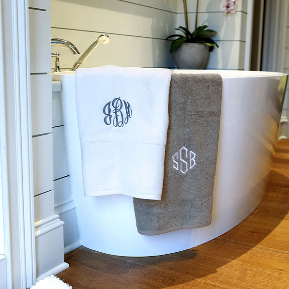 https://images.marleylilly.com/profiles/ml-product-detail/product/109908/tGQ-white-and-grey-monogrammed-bath-towels-hanging-over-tub-shiplap.jpg