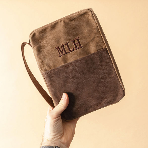 waxed canvas bible carrier in hand