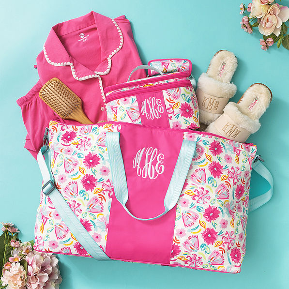 monogrammed weekend bag and train case in painted petals