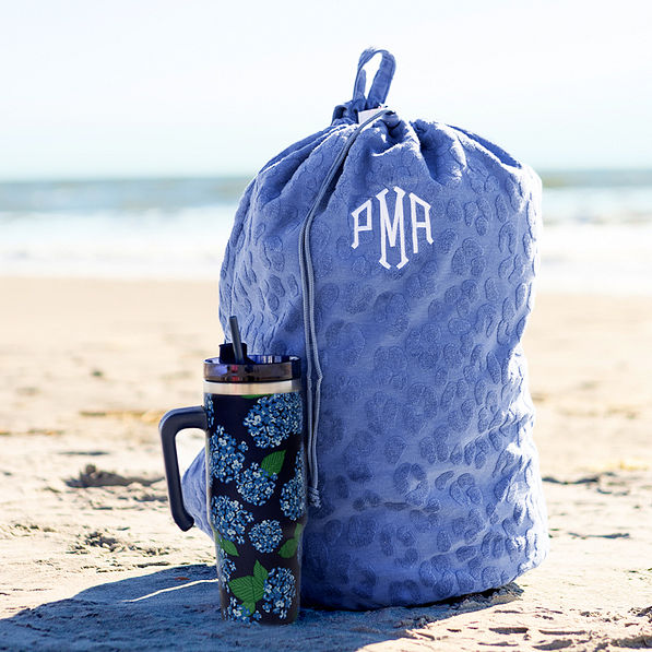 Monogrammed Laundry Bag in cornflower leopard on beach