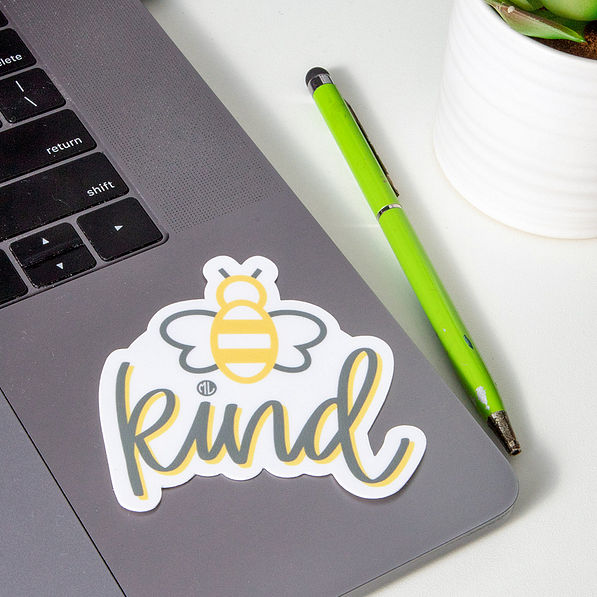be kind sticker on laptop