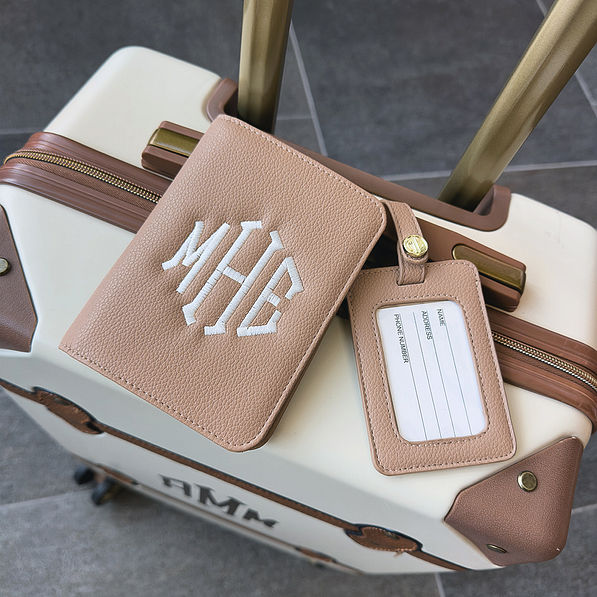 taupe luggage tag with suitcase