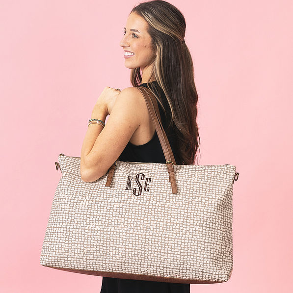girl with monogrammed khaki pebbles weekender