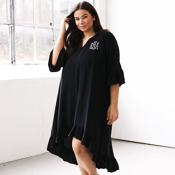 black monogrammed ruffle cover up on brunette