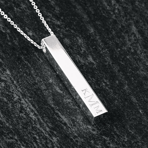 close up of silver bar necklace