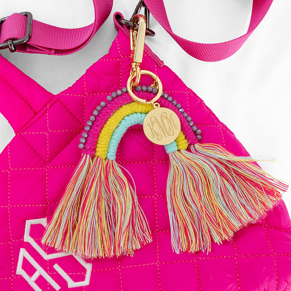 personalized rainbow key chain on hot pink bag