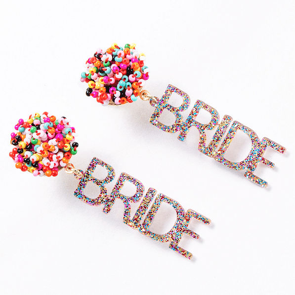 bride statement earrings on marble