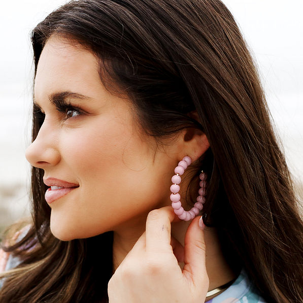 beaded hoop earrings in ear